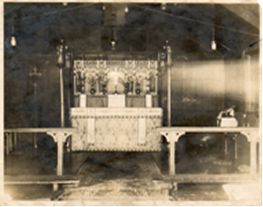 A black and white photo of the Tin Chapel